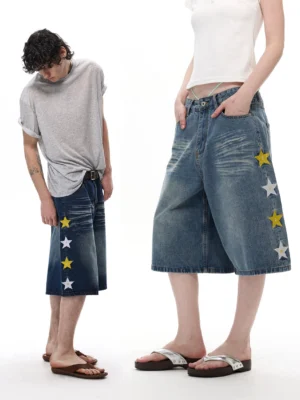 Dark blue star appliqué wide-leg denim knee shorts shown in front and side streetwear outfit views