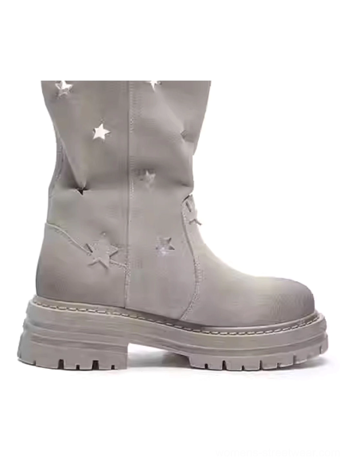 Single perforated-star platform cowboy boot side profile static view on white background displaying faded suede and star cutout decorations