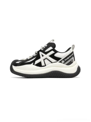 Star-lace wave-sole chunky sneakers side three-quarter view showcasing black white color blocking and thick textured wave-patterned outsole