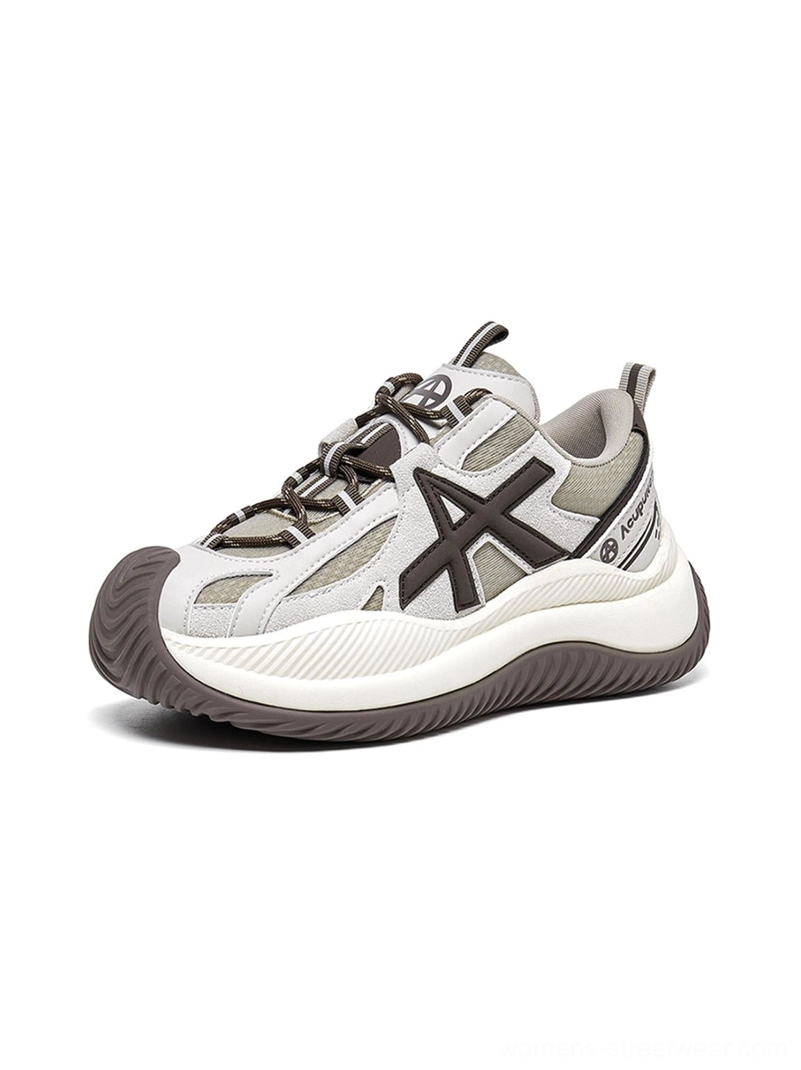 Color blocking detail of wave-sole chunky sneakers black white contrast geometric color transition design element