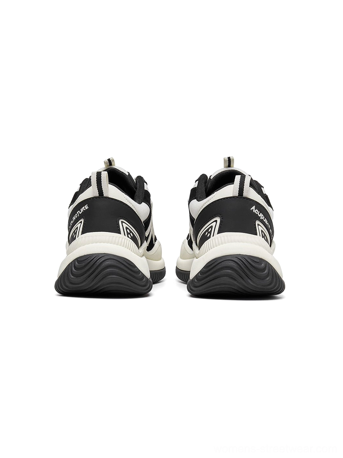 Gray colorway chunky sneakers on white background showcasing neutral monochromatic aesthetic and platform elevation height