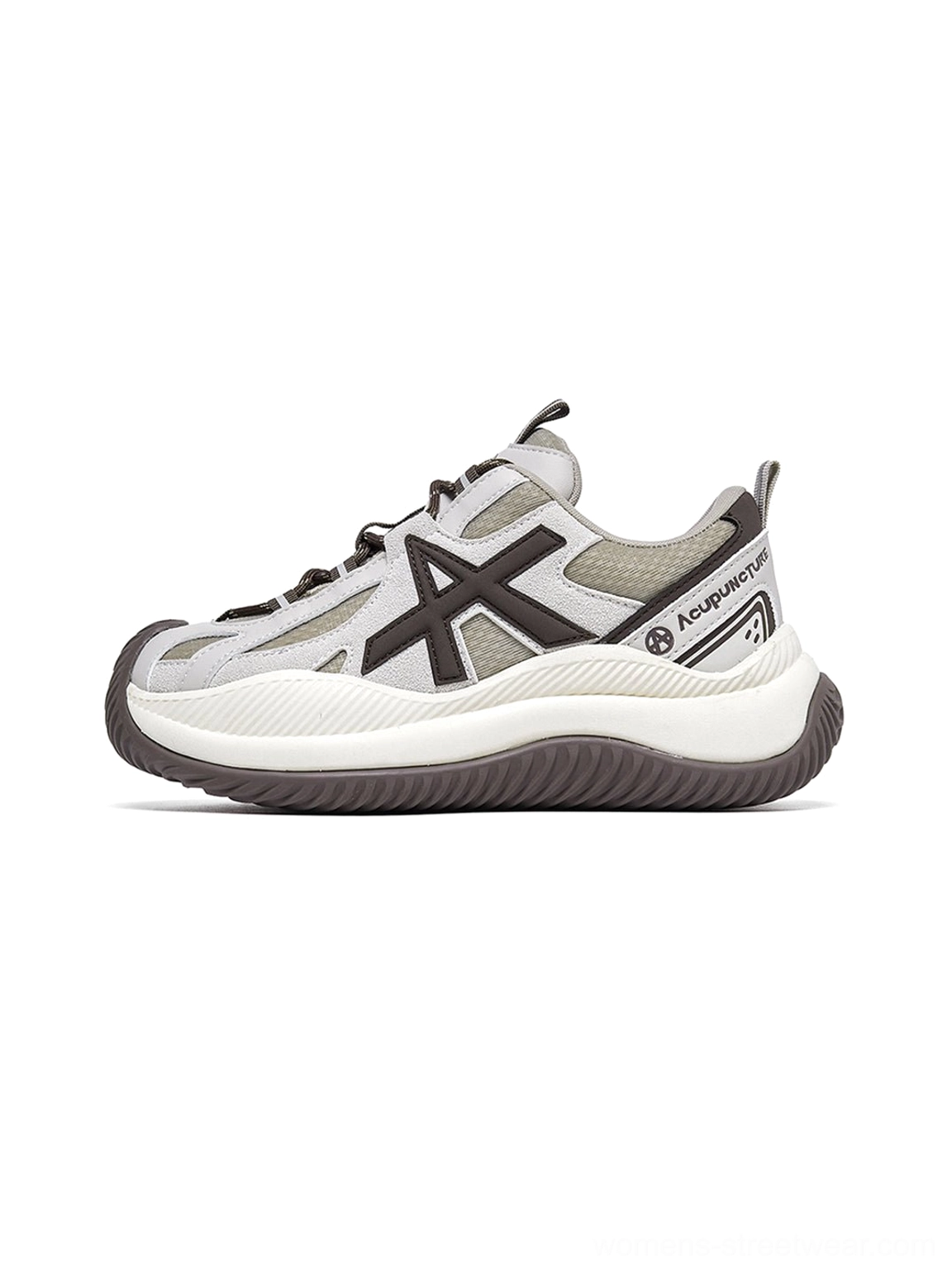 Gray wave-sole chunky sneakers complete presentation suitable for neutral styling monochromatic aesthetic streetwear