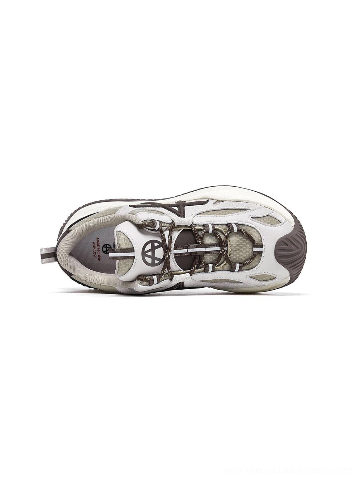 Chunky sneakers three-quarter angle showcasing layered graphic panels dimensional depth upper construction design