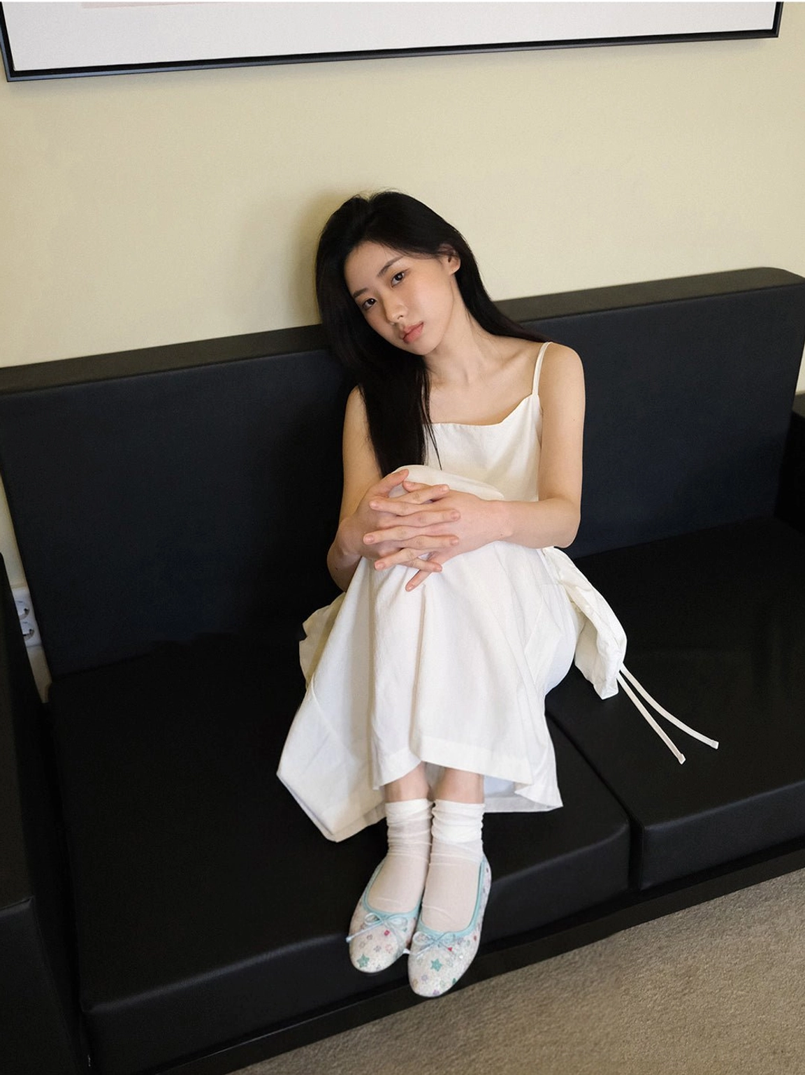 Star print bow ballet flats styled with a white slip dress and white socks for a soft balletcore outfit