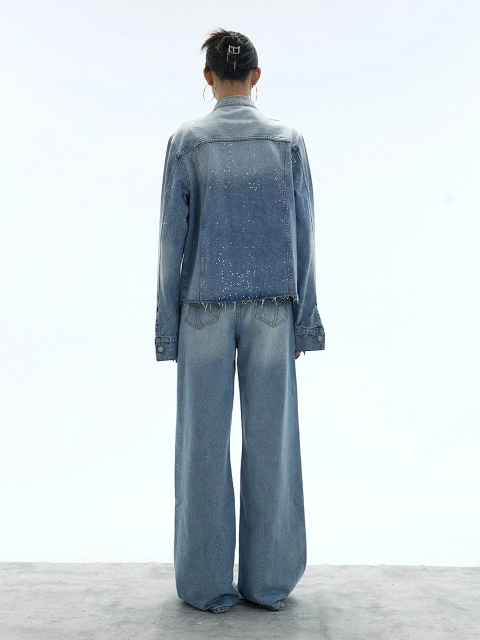 Stardust fade glitter wide-leg jeans in washed blue with a relaxed Y2K streetwear silhouette