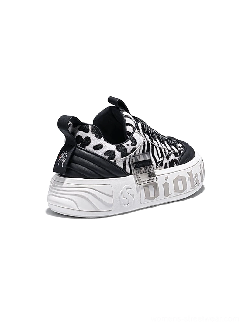 Statement leopard and zebra chunky sneakers styled as bold contemporary streetwear footwear