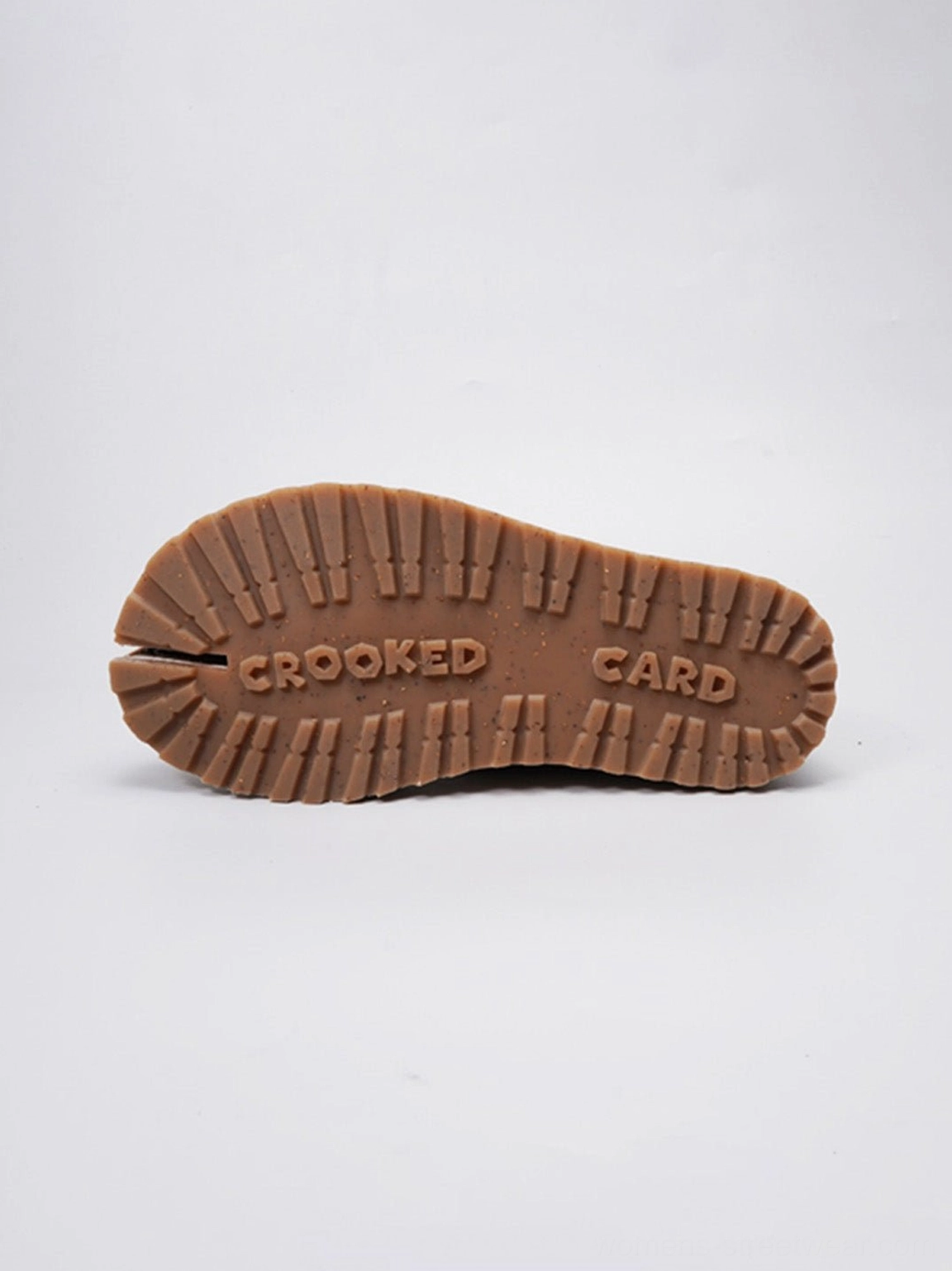 Statement split-toe suede-finish chukka boots combining East Asian streetwear influence with classic leather craftsmanship