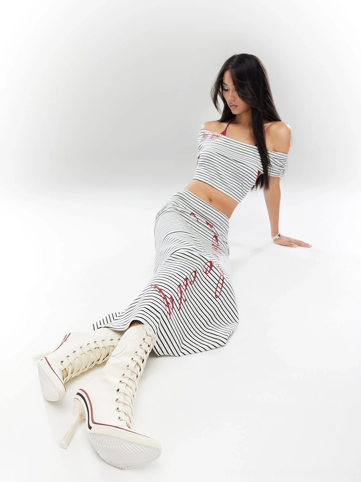 Canvas stiletto sneaker boots both colorways comparison black and white side-by-side product photography showing color options design consistency and streetwear versatility