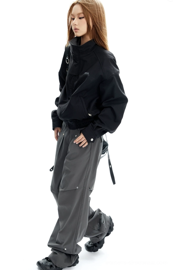 Streetwear cropped bomber jacket silhouette with structured collar, front zip closure, gathered hem, and practical side pockets