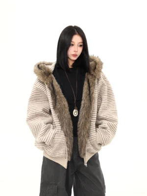 Oatmeal striped faux fur hooded jacket in an oversized winter streetwear fit styled with a black top and dark cargo pants