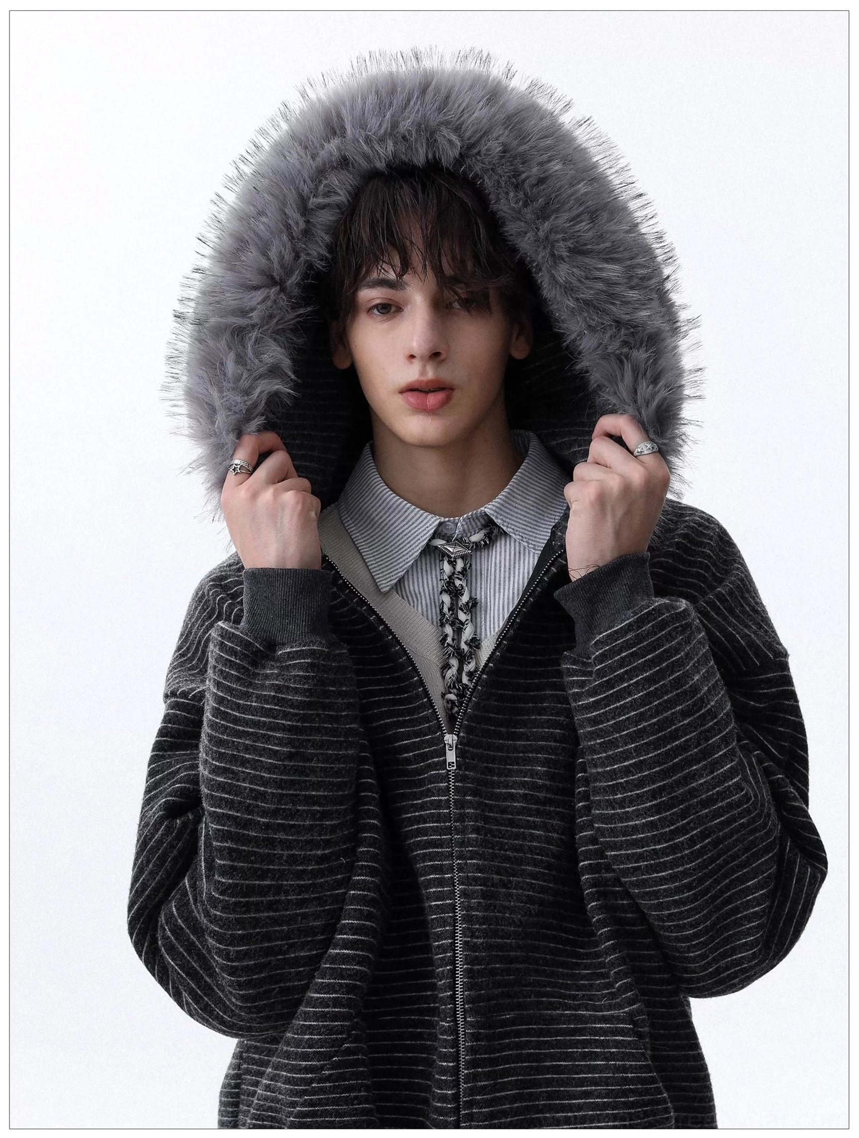 Dark gray striped faux fur hooded zip hoodie close up in Seoul inspired layered outfit