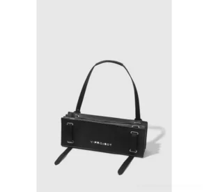 Front three-quarter view of a structured black rectangular shoulder bag with silver hardware, smooth finish, long shoulder strap, and dangling strap details