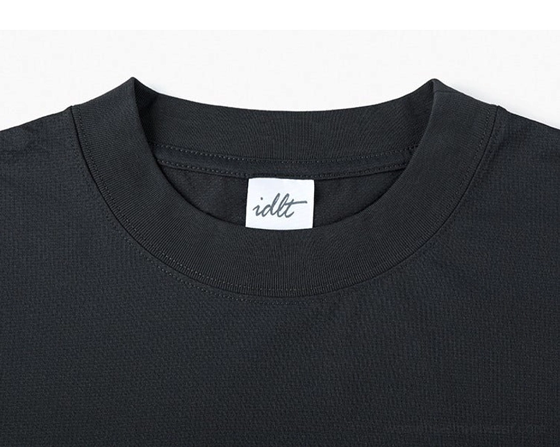Structured relaxed fit tee with wide chest and dropped shoulder silhouette for modern unisex styling