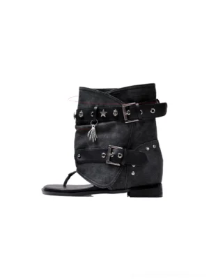 Black studded buckle thong ankle boot sandal with star hardware tassel charms and open heel side view
