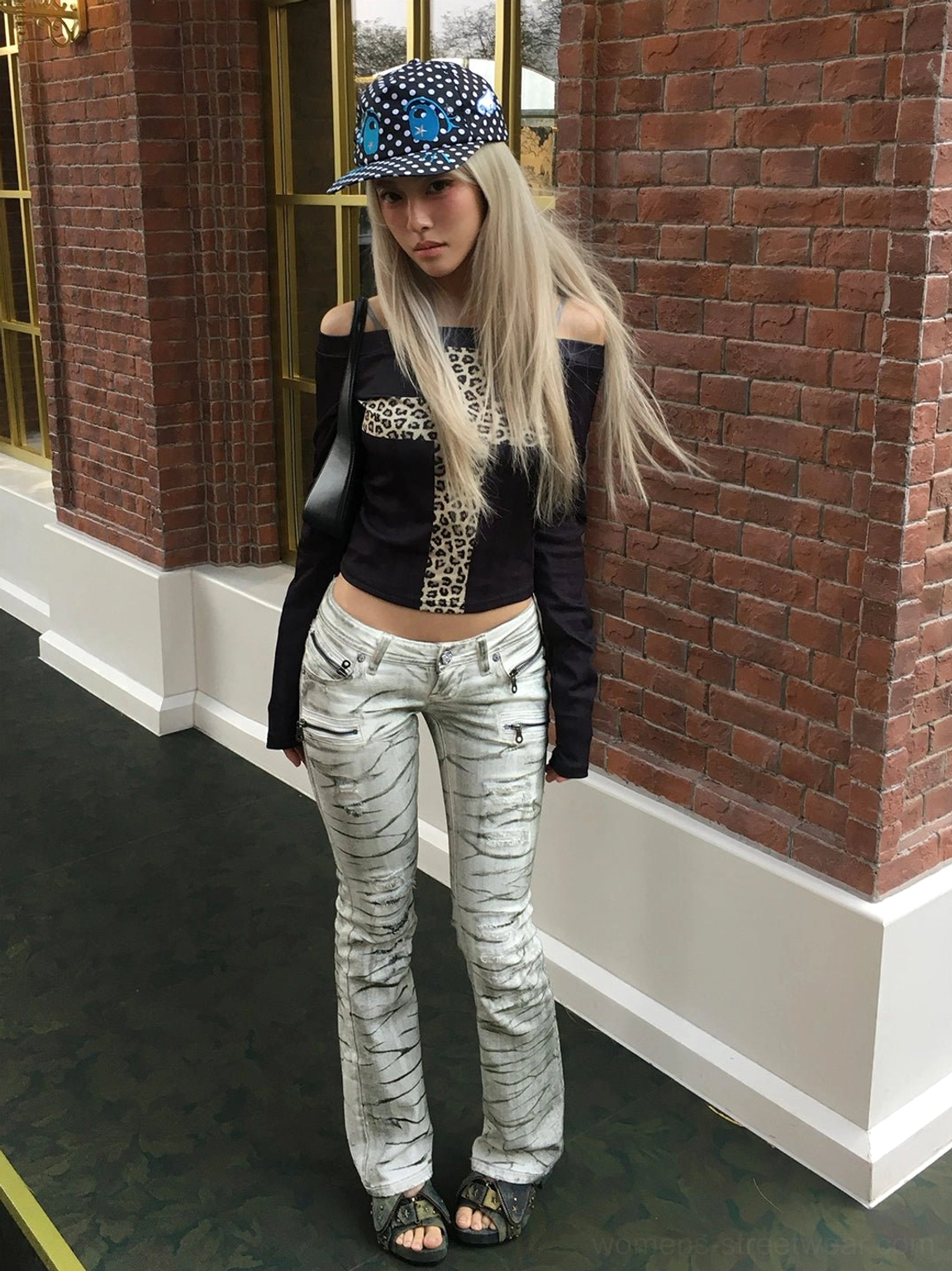 Female model styling studded denim western peep-toe slingback heels with retro Y2K fashion outfit