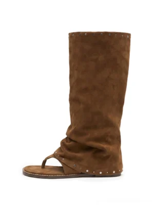Brown studded suede thong sandal boots with a ruched tall shaft, silver rivet trim, open toe and flat sole front product view