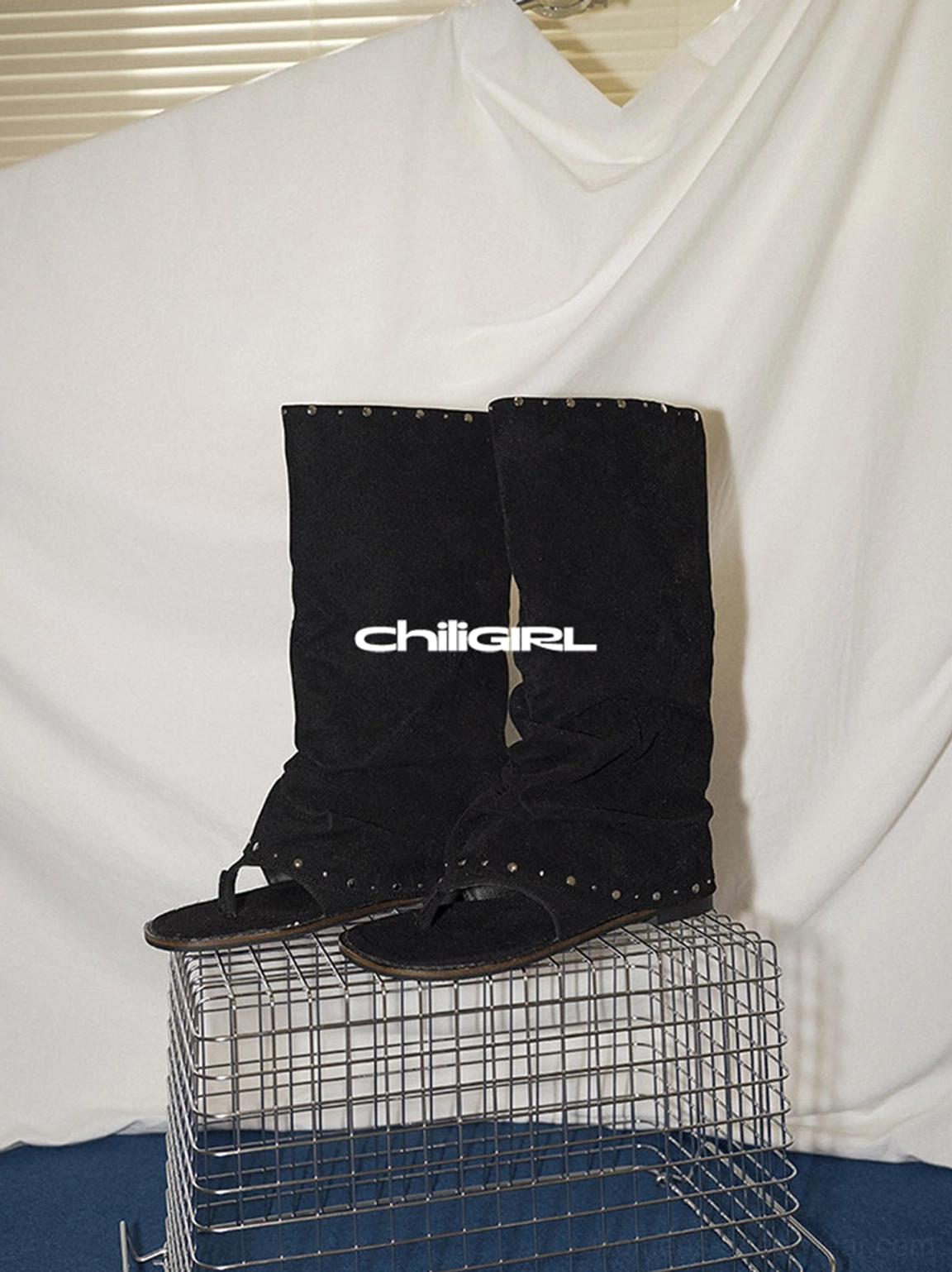 Studded suede thong sandal boots with a relaxed tall shaft and silver rivet trim streetwear footwear view