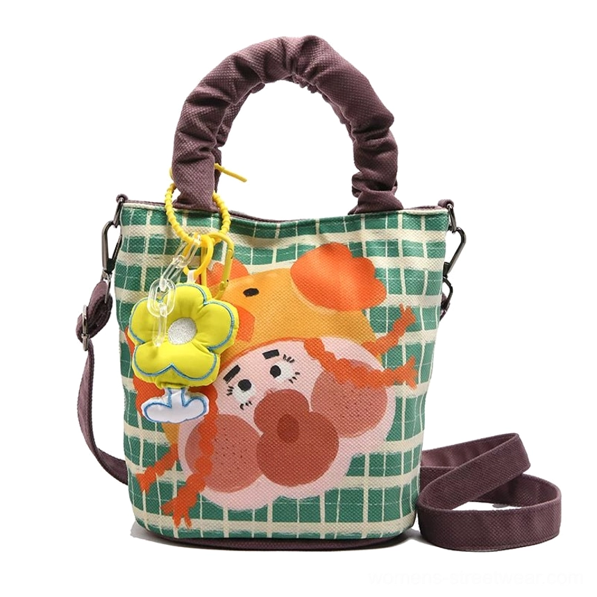 Style 6 orange variant cartoon tote front three-quarter view with distinct girl graphic and color-coordinated handle design