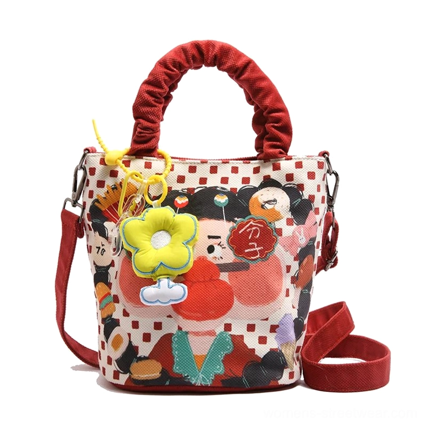 Style 6 white cartoon tote bag featuring clean light color base with bold character illustration and blue padded handles