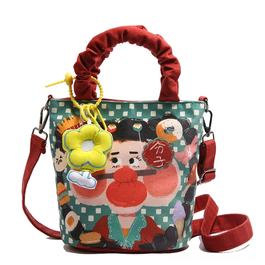 Style 7 green colorway cartoon tote displaying vibrant color combination and playful girl character graphic streetwear design