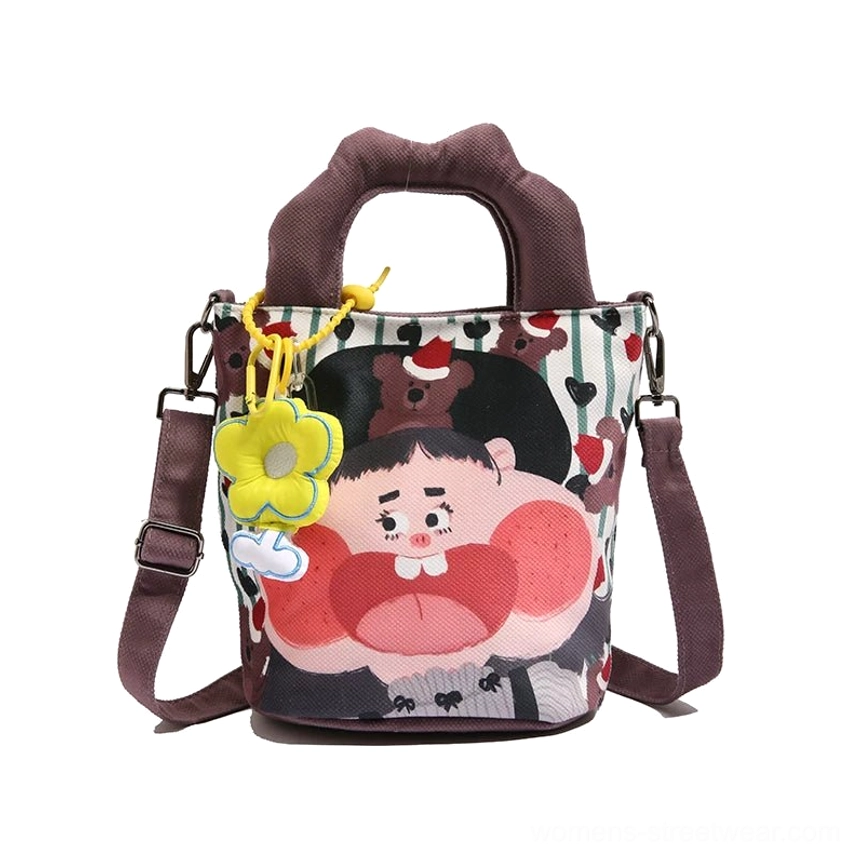 Style 7 white colorway cartoon tote featuring bright base with distinctive character graphic and Freedom text streetwear style