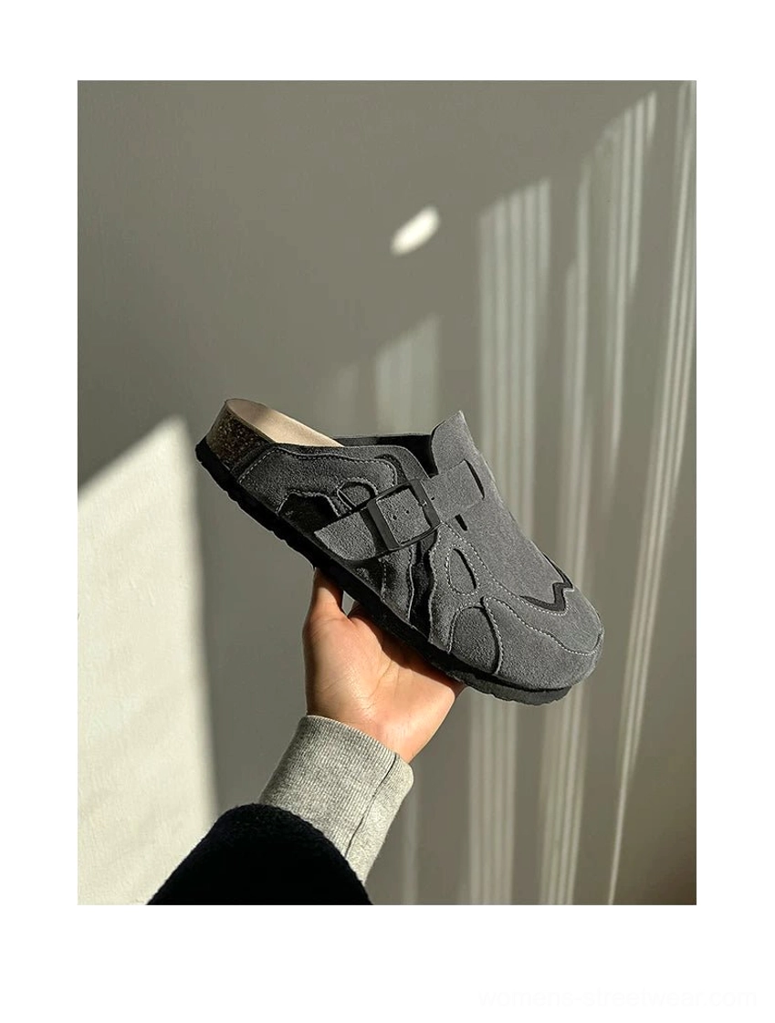 Dark grey suede buckle cork footbed streetwear mule clog showing textured upper and adjustable strap