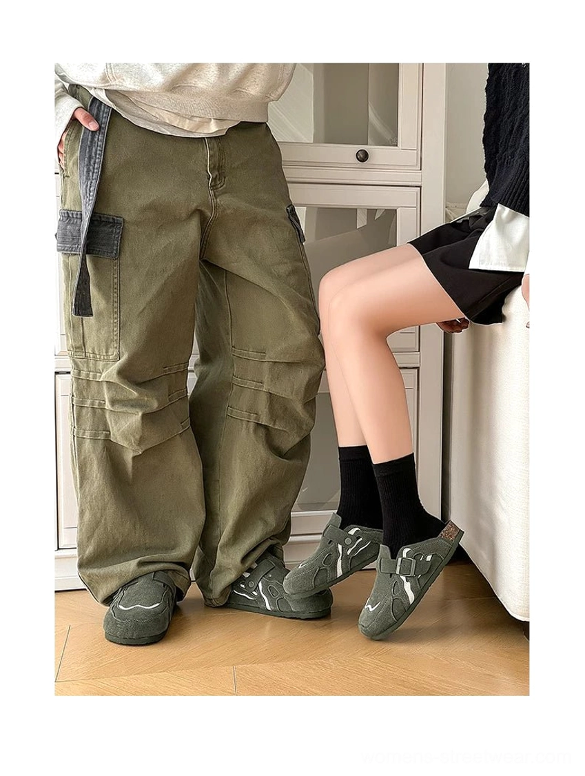 Couple wearing military green and dark grey suede buckle cork footbed streetwear mule clogs