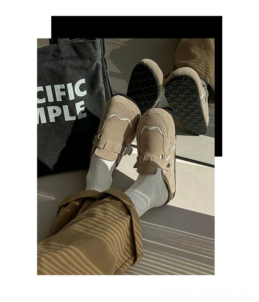Suede buckle cork footbed streetwear mule clogs side profile showing open-back slip-on construction