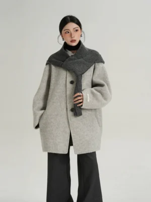 Suli Cloud light heather grey oversized wool coat with layered knit scarf detail front full body studio view