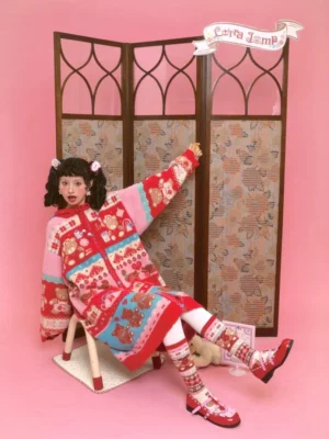 Side view of colorful sweet bear Fair Isle hooded long cardigan with relaxed drop shoulders and retro kawaii jacquard pattern