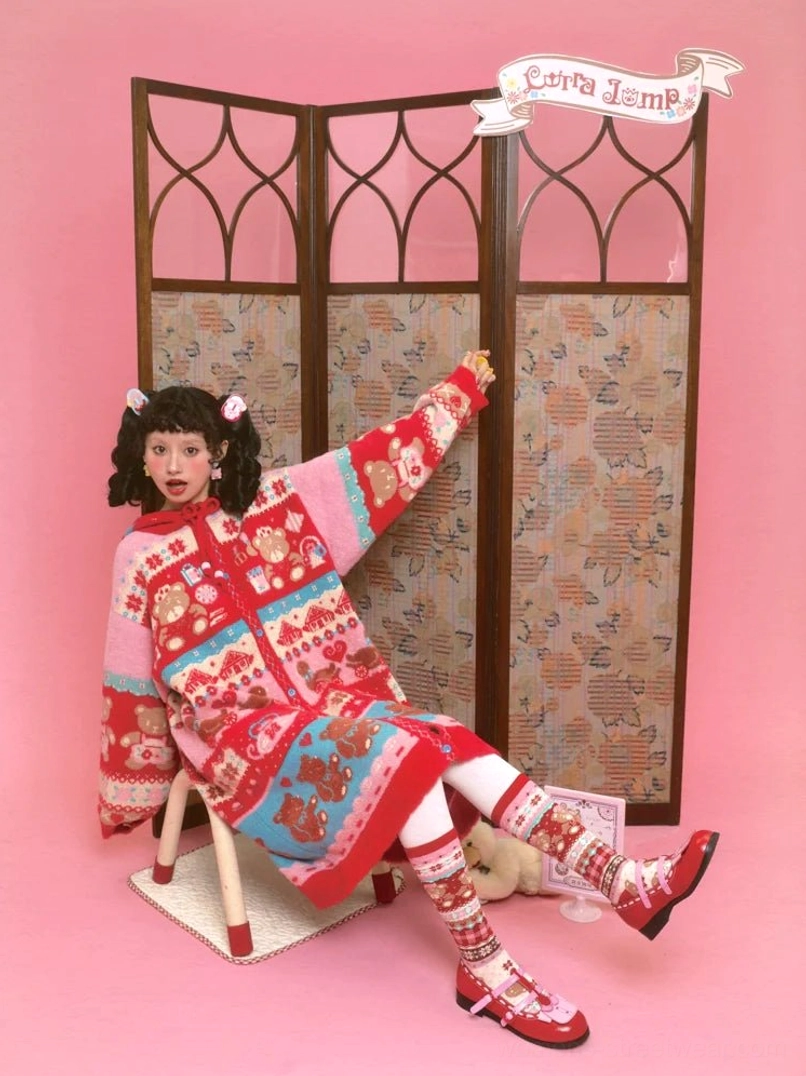 Side view of colorful sweet bear Fair Isle hooded long cardigan with relaxed drop shoulders and retro kawaii jacquard pattern