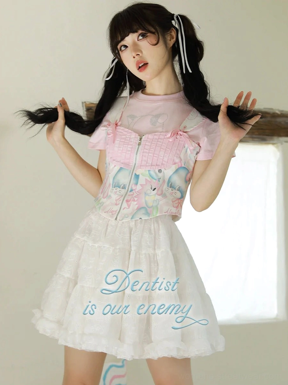 Sweet bunny print corset camisole styled with a pink top and ruffled white skirt in a playful Y2K Lolita streetwear outfit