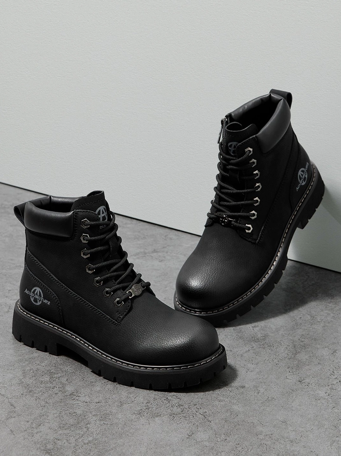 Tactical zip-front lug-sole ankle boots gorpcore influence chunky sole technical footwear aesthetic