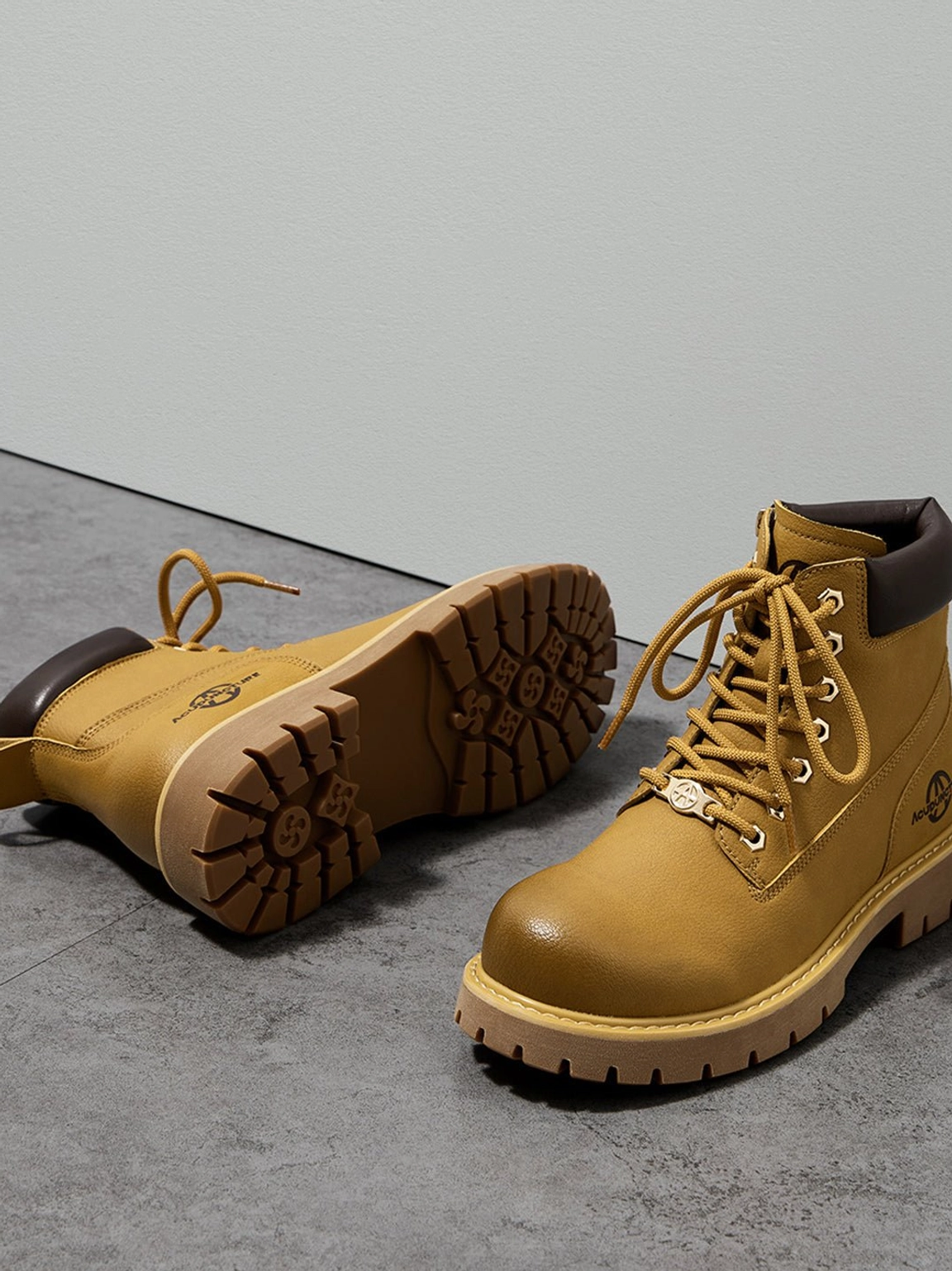 Zip-front tactical ankle boots contrast lug sole rubber tread pattern grip detail gorpcore inspiration