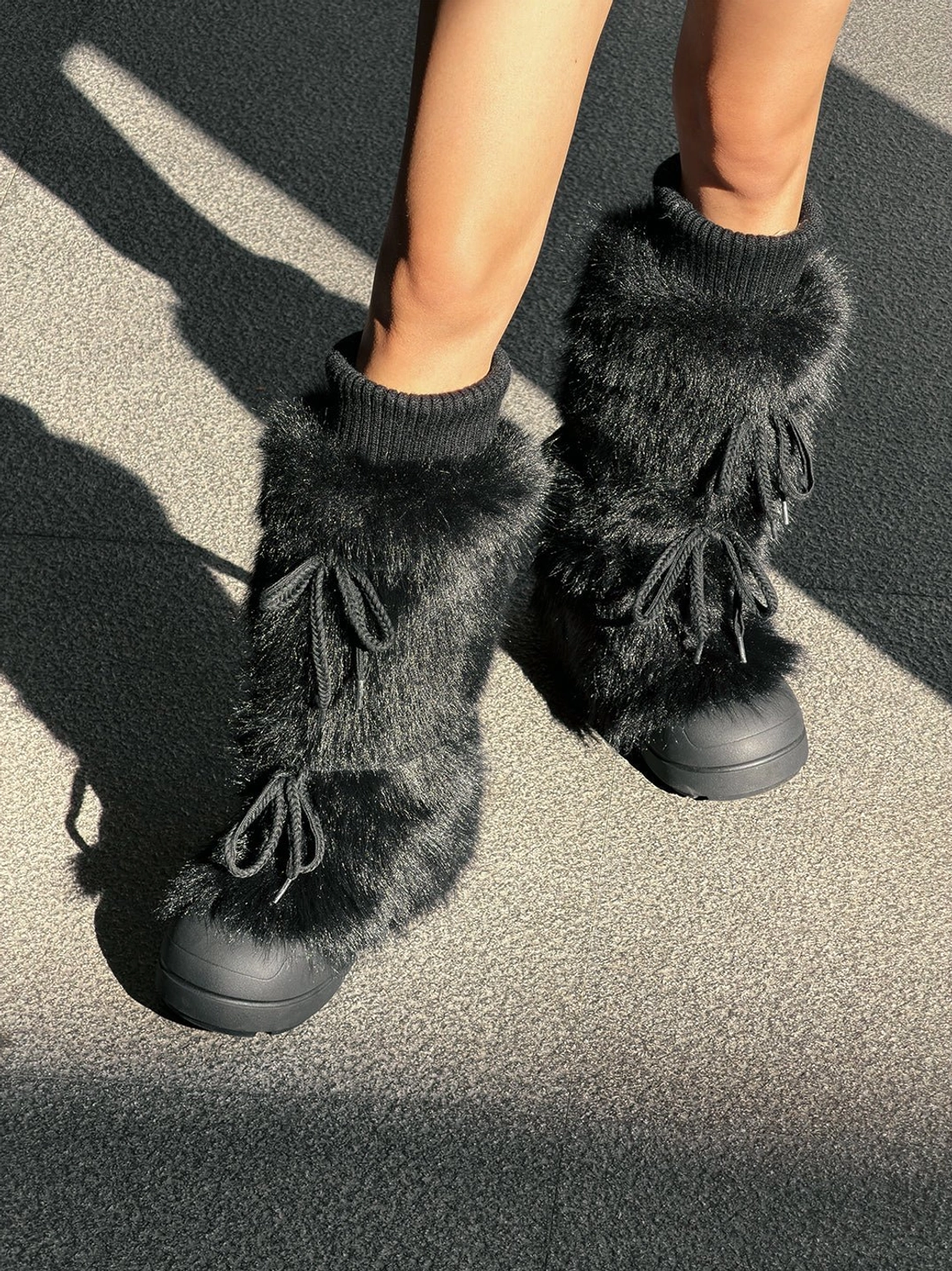Tall platform boots with soft plush lining detail and bold streetwear proportions