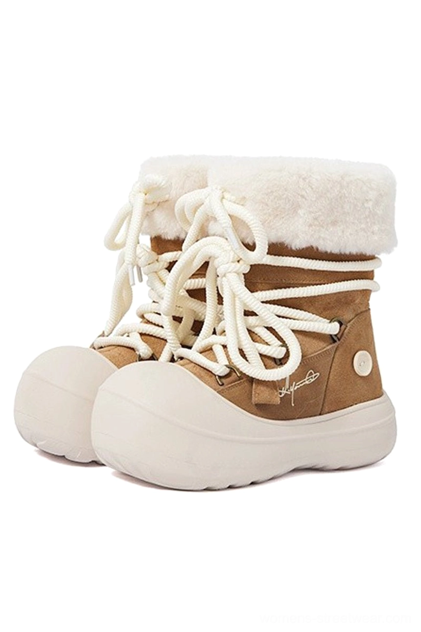 Tan fleece-lined suede platform winter boots with cream rope laces and thick off-white rounded sole front three-quarter view