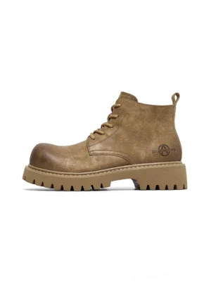 Tan round-toe lug-sole work boots side profile view displaying suede-finish leather upper with lace-up closure and rugged rubber outsole
