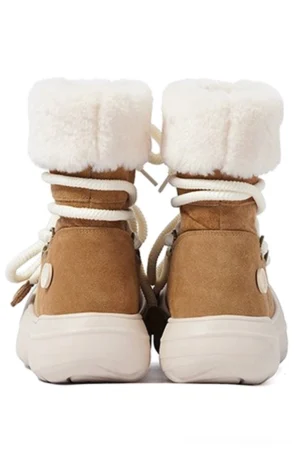 Rear view of tan suede fleece-lined platform winter boots with fluffy white cuff thick sole and heel button detail