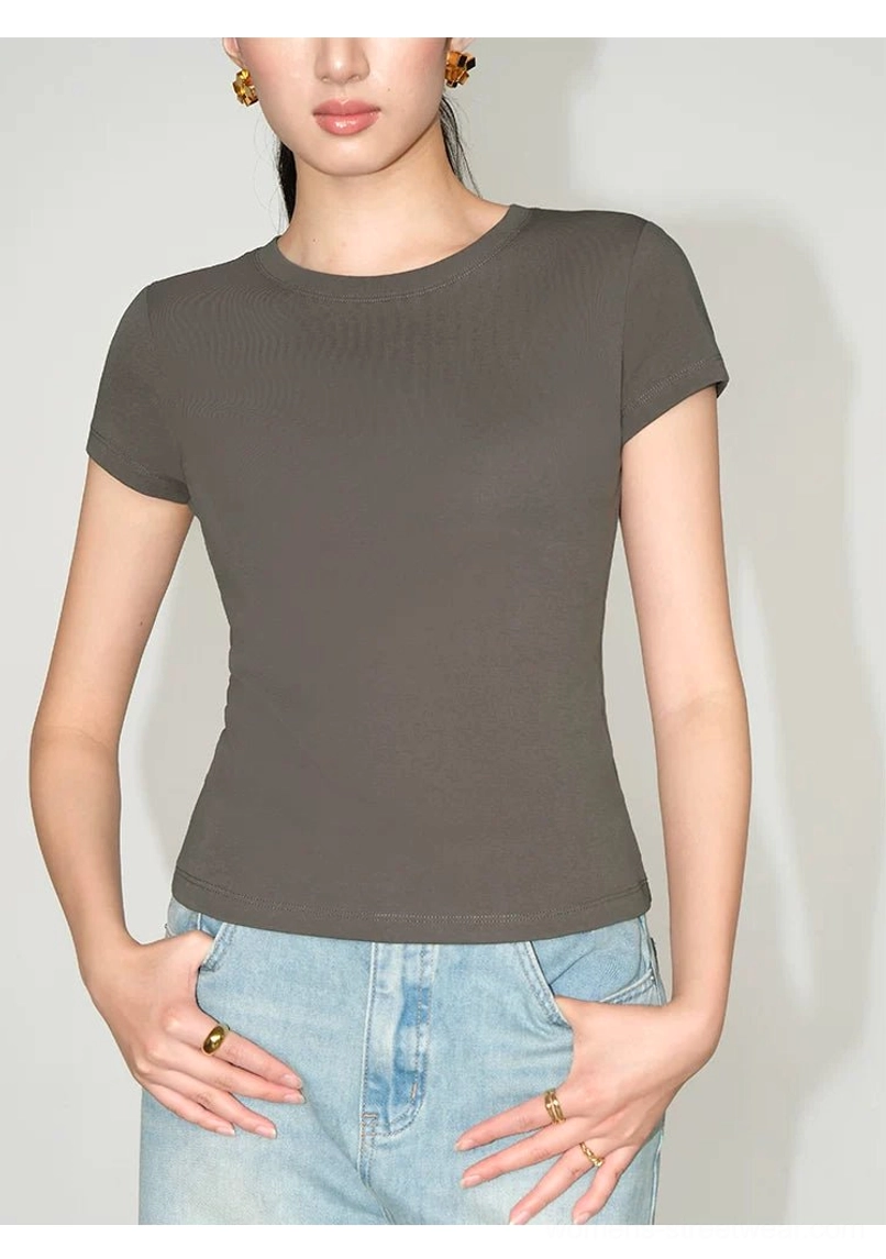 taupe gray crew neck fitted t-shirt partial front view with light blue straight jeans clean minimal style