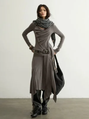 Front view of taupe Korean streetwear outfit set showing asymmetric draped torso, decorative front buttons, fitted long sleeves, wrap skirt, and wide waist belt