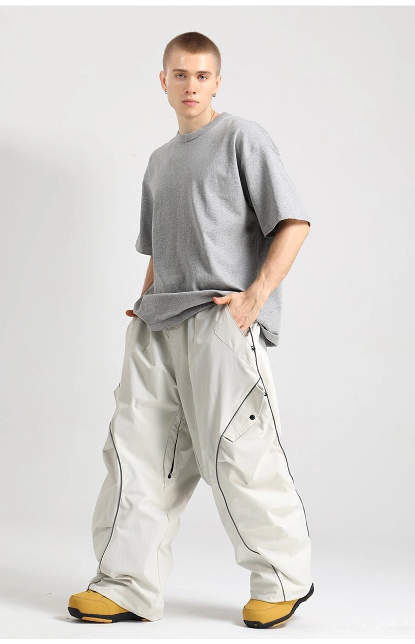 Technical reflective piped snow pants with cargo pockets and oversized freestyle snowboard fit