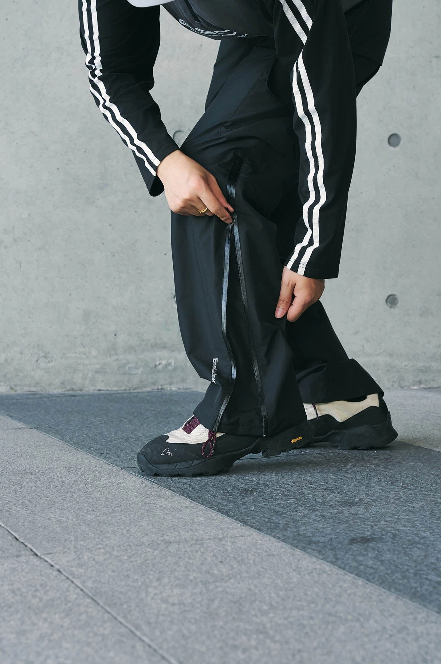 Techwear waterproof cargo pants product image featuring utility pocket detailing and a contemporary straight-leg streetwear shape