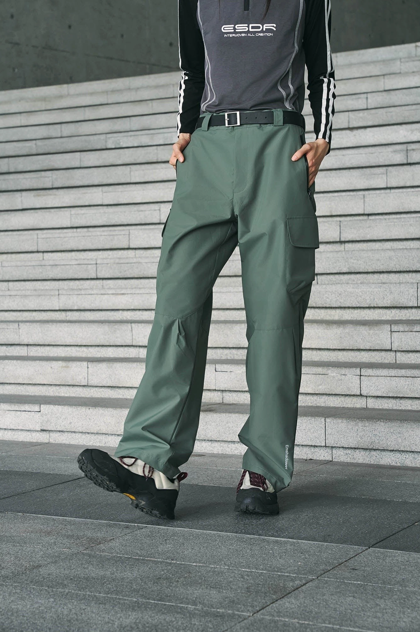 Techwear waterproof streetwear cargo pants product image showing a relaxed utility silhouette and functional outdoor styling