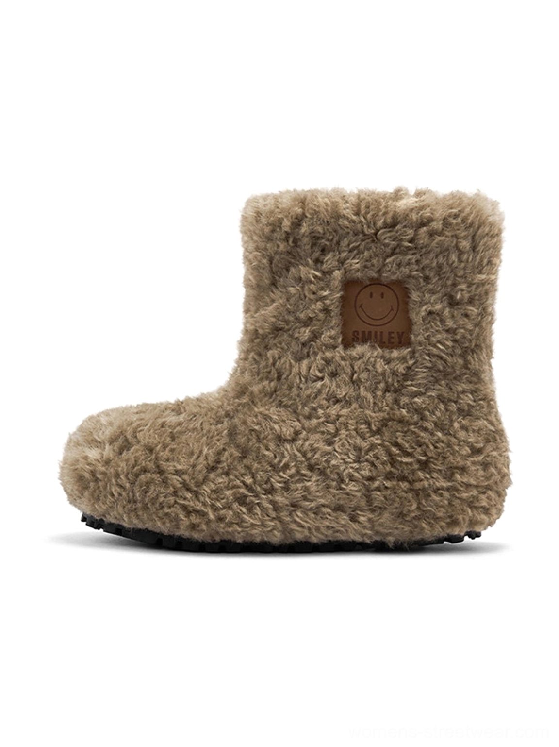 Brown teddy fleece platform ankle boot with smiley patch and thick black textured outsole side view