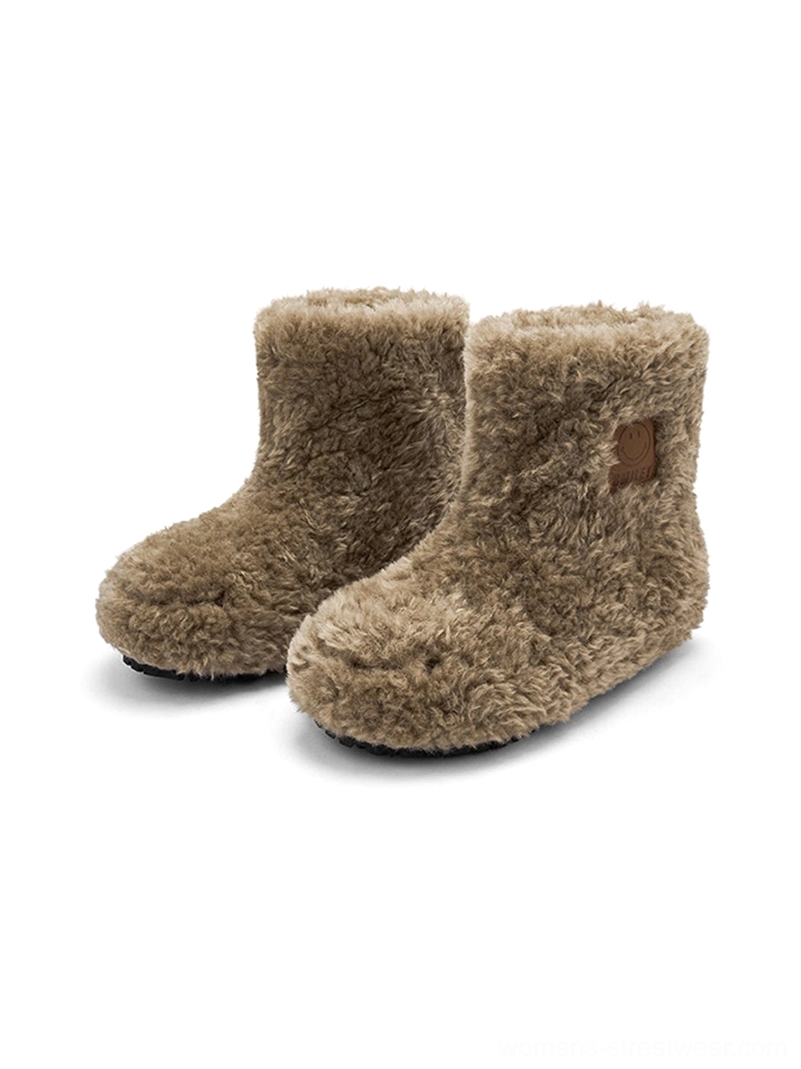 Pair of deep khaki teddy fleece platform ankle boots with brown smiley patches and chunky black soles