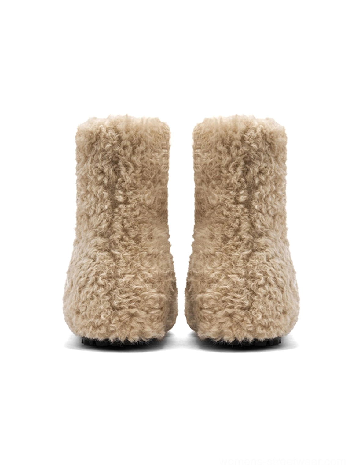 Rear view of khaki teddy fleece platform ankle boots showing rounded heels and black textured platform outsoles