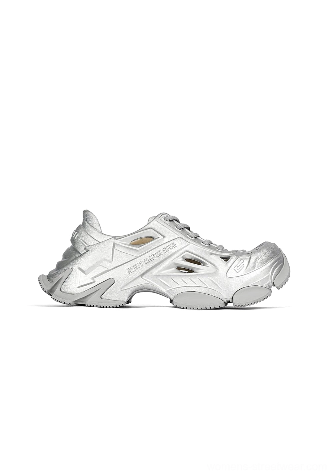 Light metallic silver futuristic platform clog sneaker with hollow cutout upper and thick chunky outsole on white background