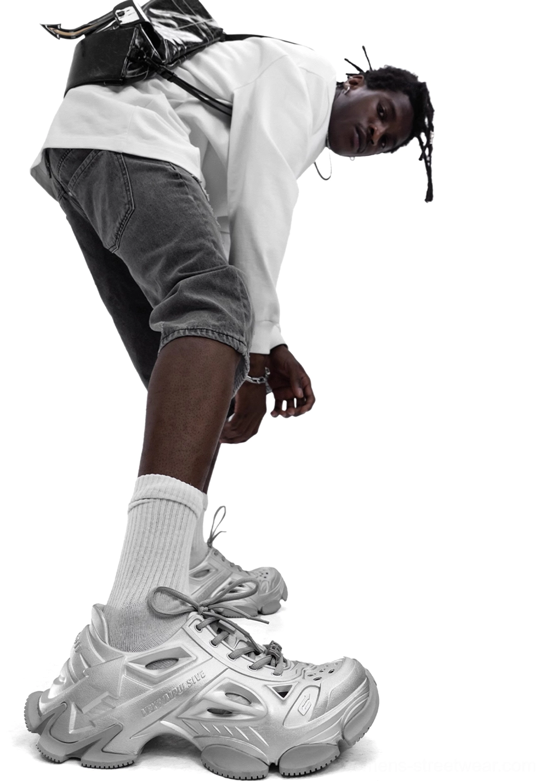 Silver Time-Space platform clog sneakers worn with denim shorts and a white sweatshirt for Seoul-inspired urban streetwear