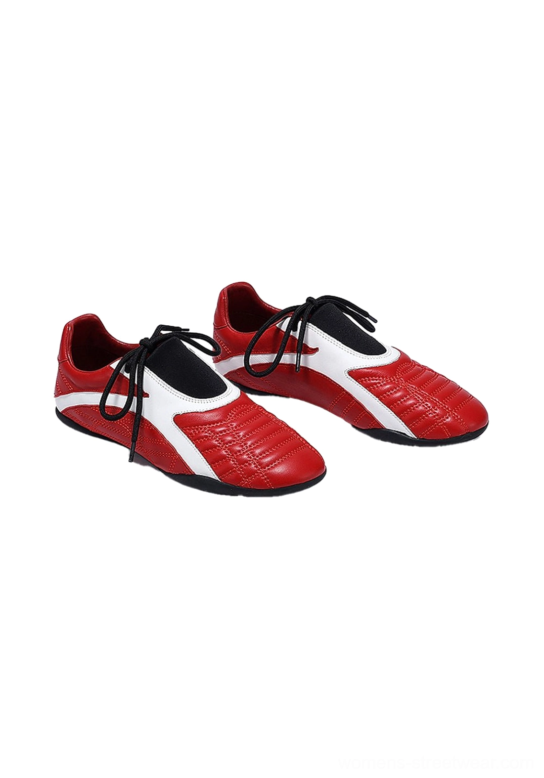 Top-down view of red and white quilted flat sole sneakers showing the textured upper, side panels, and black lace details