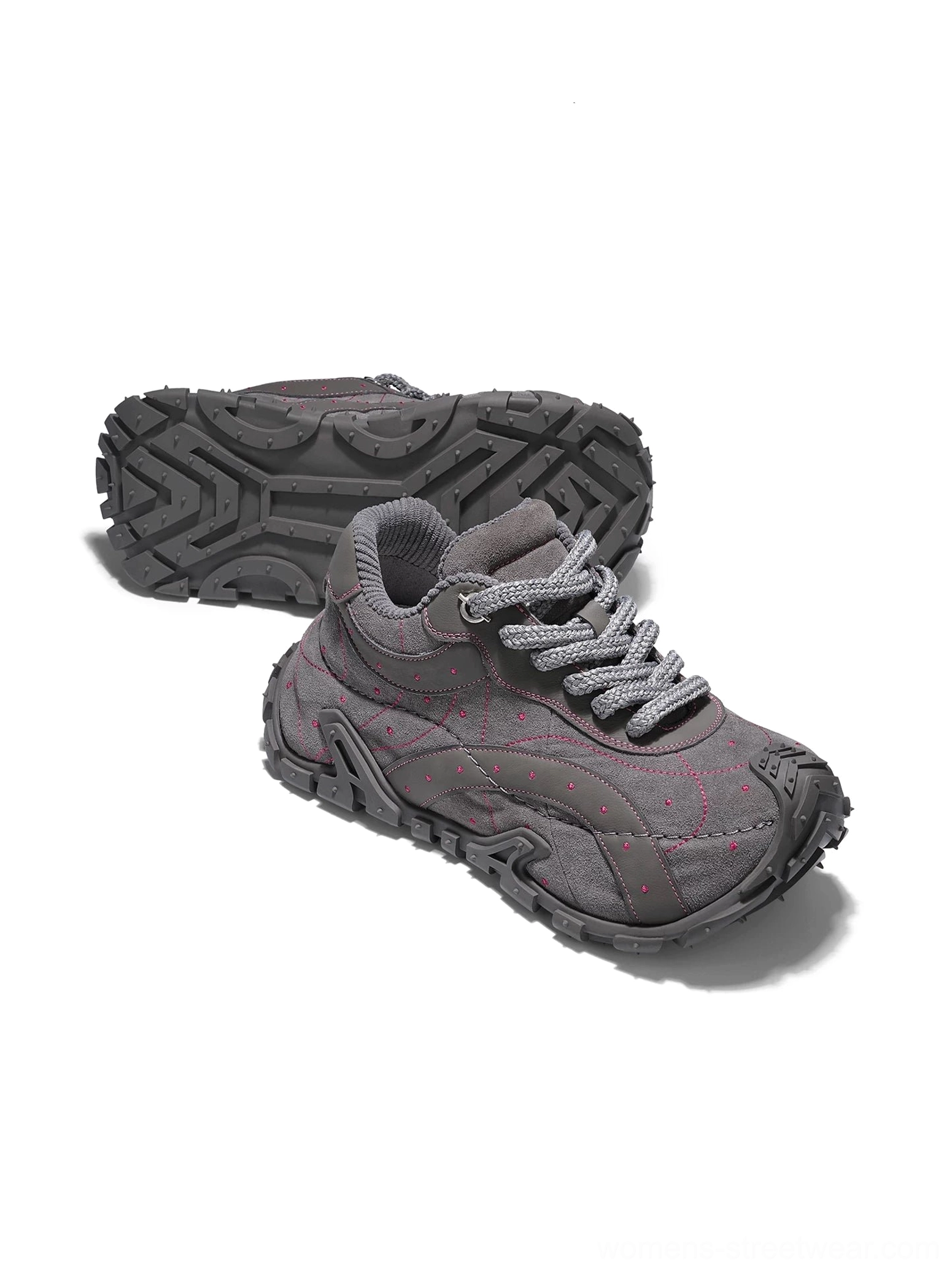 TrailGrid chunky sneakers shown from the rear with a separate outsole view, tonal leather construction, stitched details, and rugged multi-terrain traction pattern
